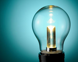 LED light bulb on blue background