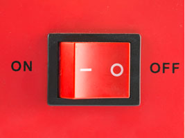 On Off Switch on red background